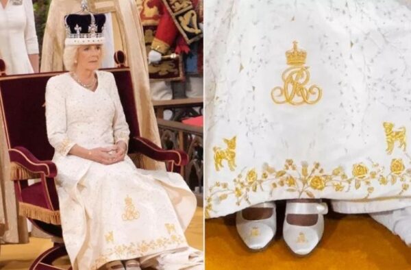 الملكة كاميلا تكرم أحفادها وكلابها بنقوش على فستان التتويج